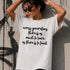 White t-shirt with black text: "across generations there is as much to learn as there is to teach".