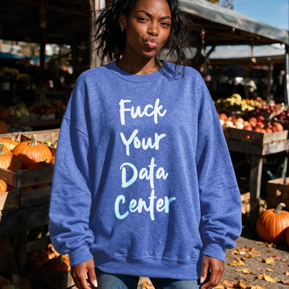 Blue sweatshirt with &amp;quot;Fuck Your Data Center&amp;quot; text, worn by a woman at an outdoor market.