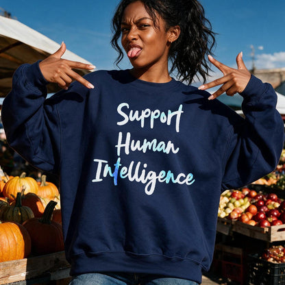 Navy sweatshirt with &amp;quot;Support Human Intelligence&amp;quot; text, featuring a woman at a market.