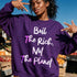 Purple sweatshirt with "Boil The Rich, Not The Planet" text.