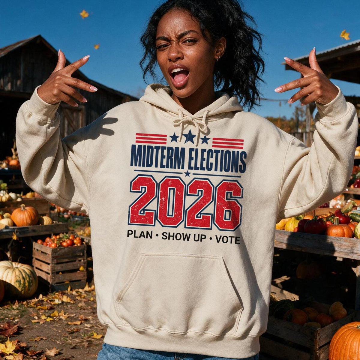 Beige hoodie with &amp;quot;Midterm Elections 2026 Plan. Show Up. Vote.&amp;quot; text.