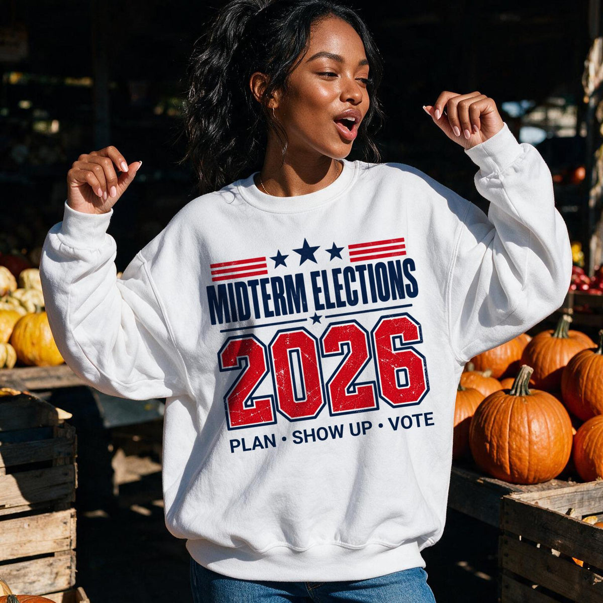 White sweatshirt with &amp;quot;Midterm Elections 2026 Plan Show Up Vote&amp;quot; text.