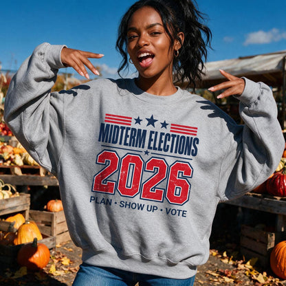 Grey sweatshirt with &amp;quot;Midterm Elections 2026 Plan Show Up Vote&amp;quot; text.