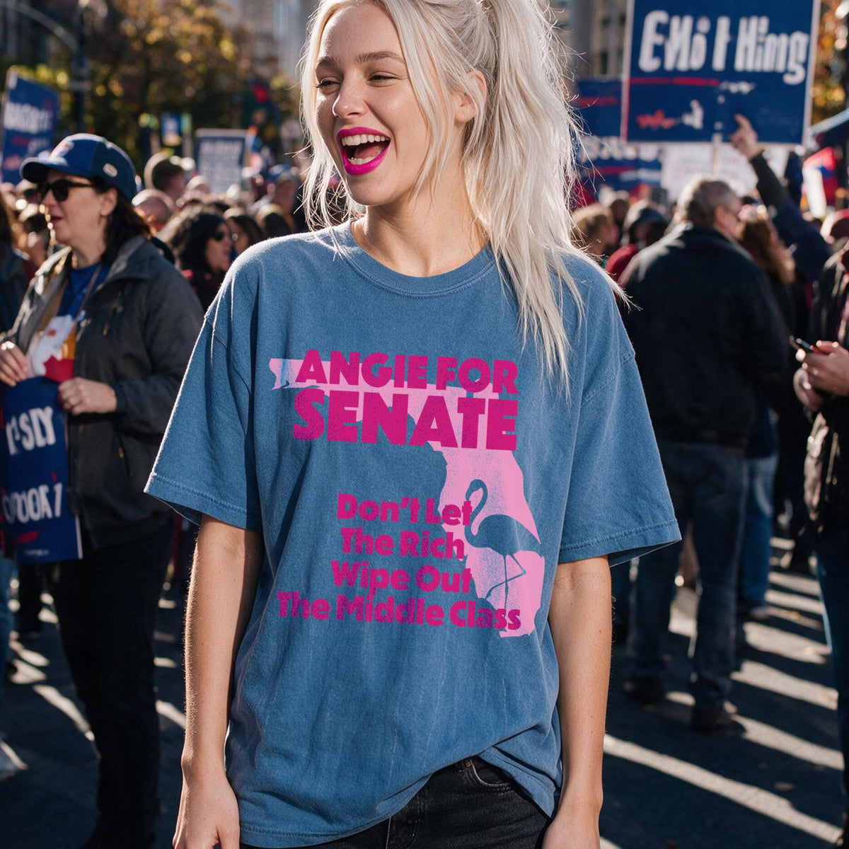 Blue t-shirt with pink text and flamingo graphic: Angie for Senate, Don&amp;