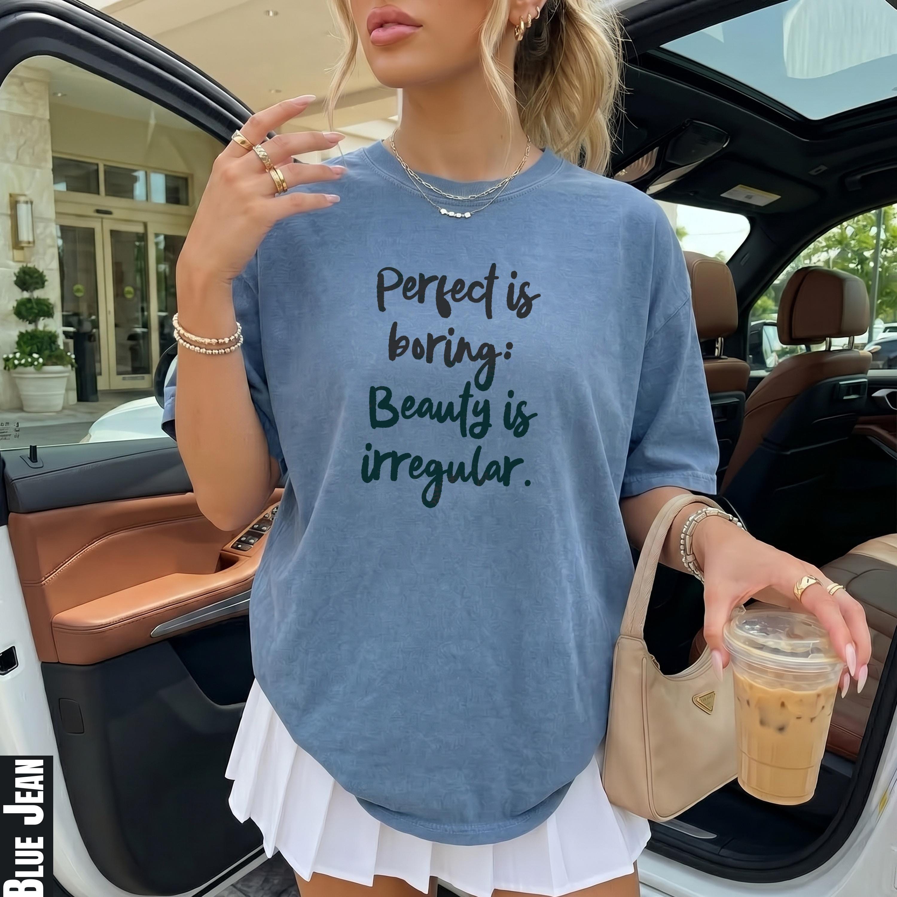 Blue jean t-shirt with text &amp;quot;Perfect is boring: Beauty is irregular.&amp;quot;