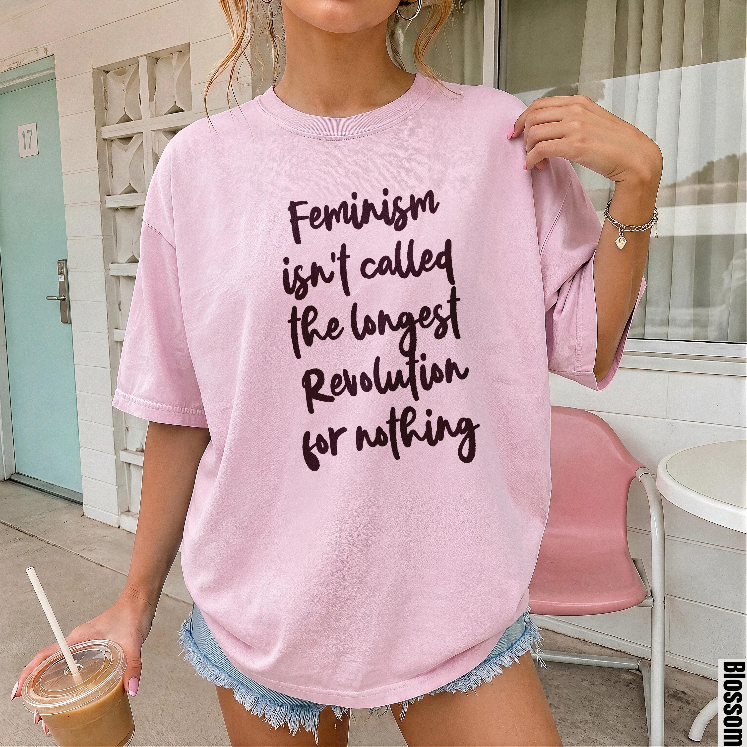 Pink t-shirt with text &amp;quot;Feminism isn&amp;