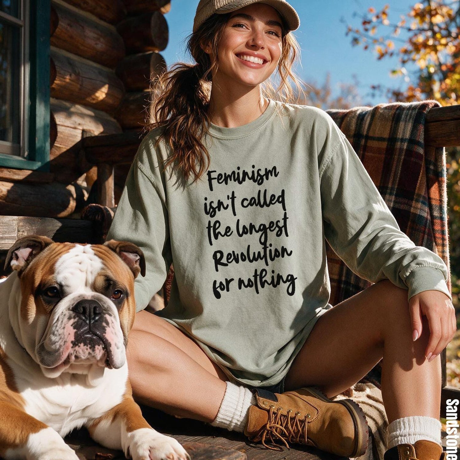 Woman wearing long-sleeve shirt with &amp;quot;Feminism isn&amp;