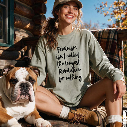 Woman wearing long-sleeve shirt with &amp;quot;Feminism isn&amp;