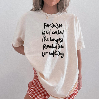 Cream t-shirt with black text reading &amp;quot;Feminism isn&amp;