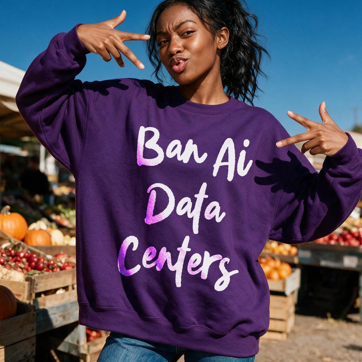 Purple sweatshirt with white text &amp;quot;Ban Ai Data Centers&amp;quot; worn by a woman.