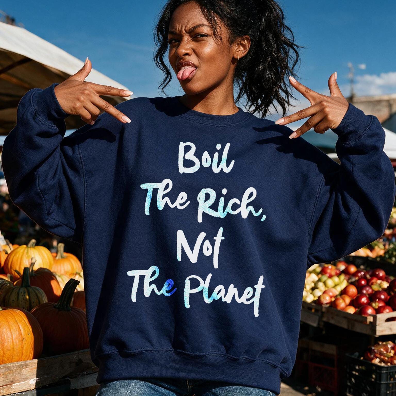 Dark blue sweatshirt with text &amp;quot;Boil The Rich, Not The Planet&amp;quot;.