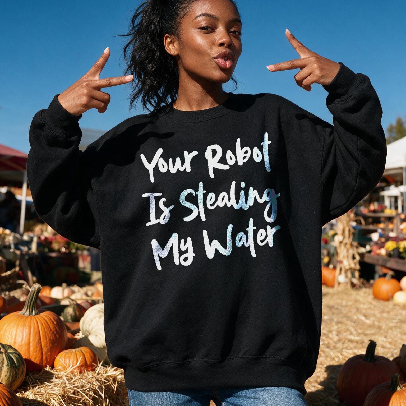 Black sweatshirt with &amp;quot;Your Robot Is Stealing My Water&amp;quot; text and a woman making peace signs.