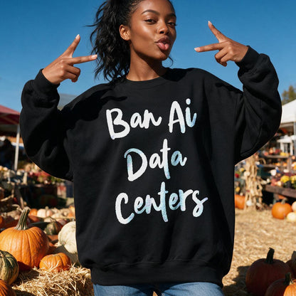 Black sweatshirt with &amp;quot;Ban Ai Data Centers&amp;quot; text, modeled by a woman in a pumpkin patch.