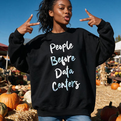 Black sweatshirt with &amp;quot;People Before Data Centers&amp;quot; text, worn by a woman outdoors.