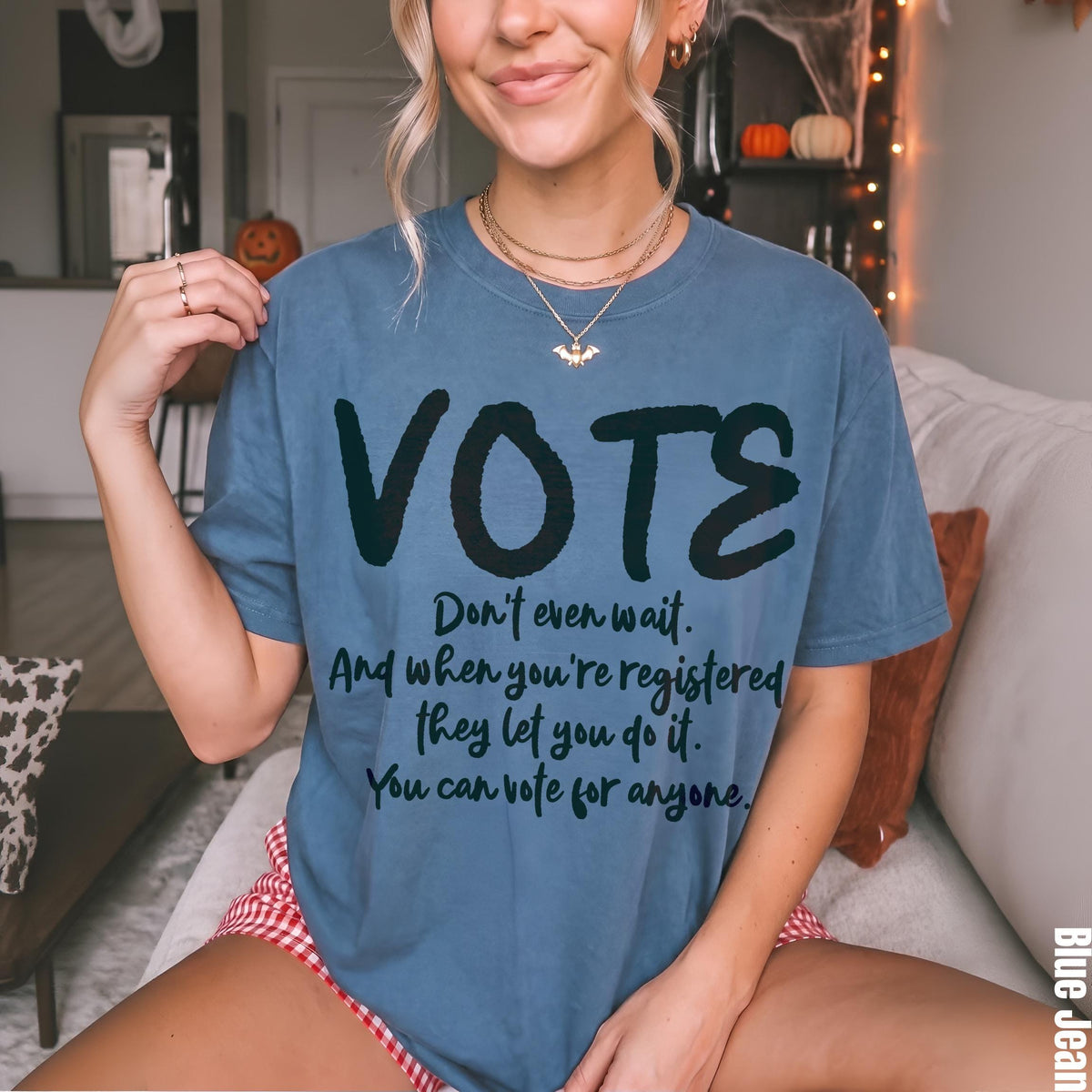 Blue t-shirt with &amp;quot;VOTE&amp;quot; and voting-related text.
