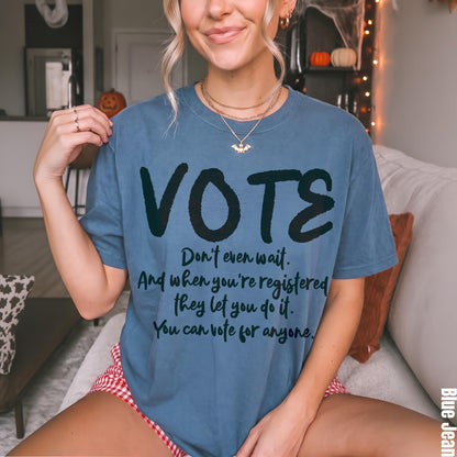 Blue t-shirt with &amp;quot;VOTE&amp;quot; and voting-related text.