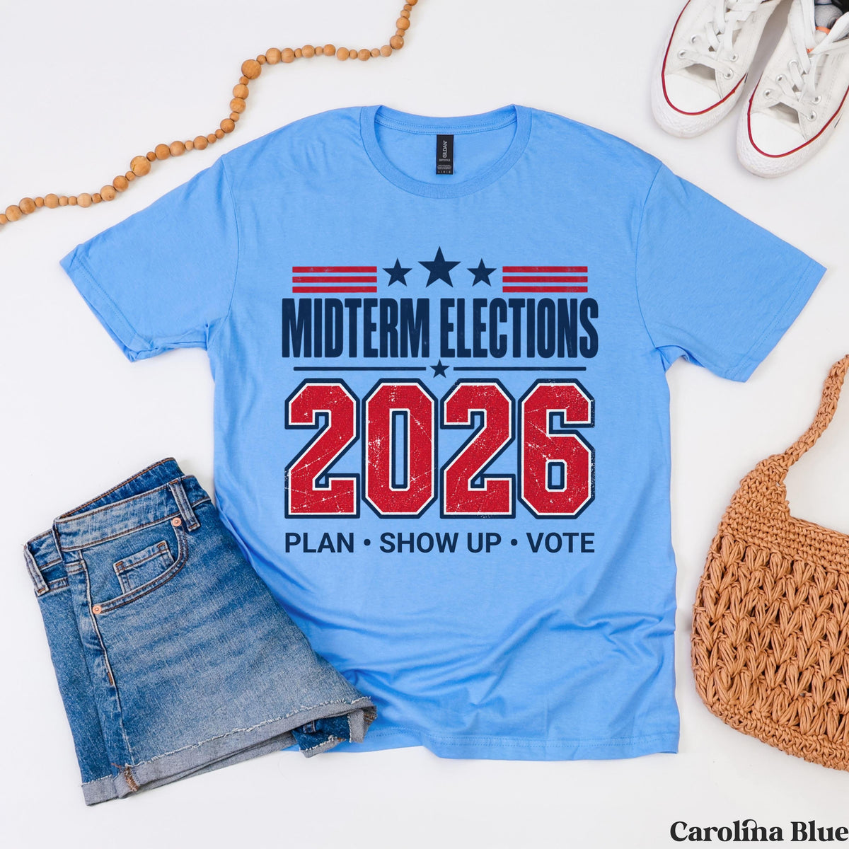 Blue t-shirt with &amp;quot;Midterm Elections 2026 Plan Show Up Vote&amp;quot; text.