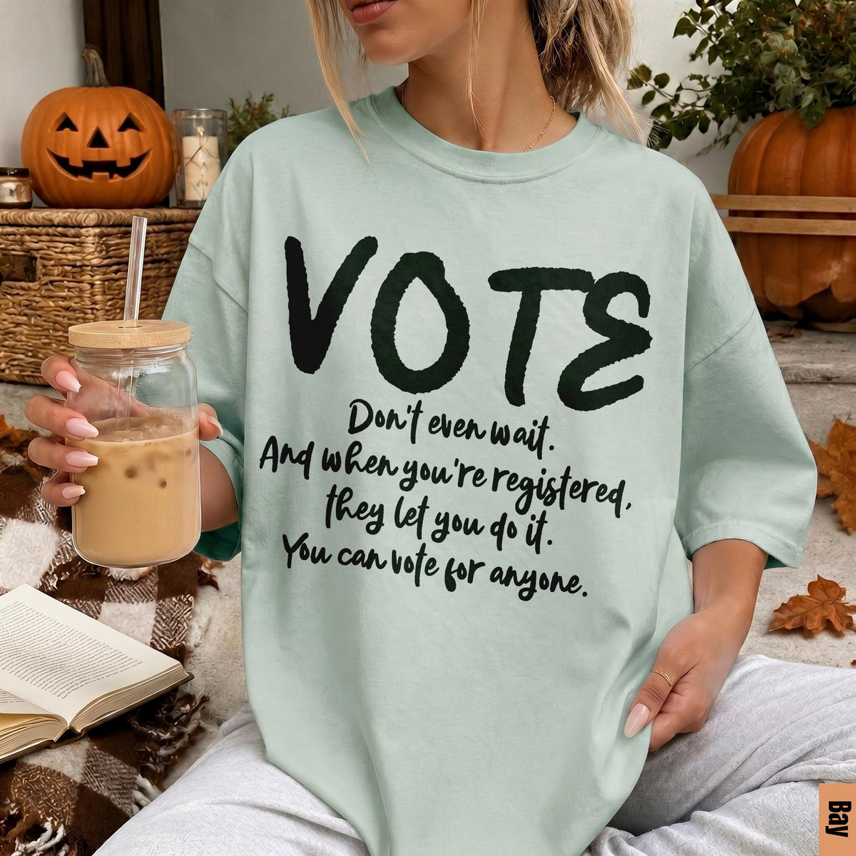 Light green t-shirt with &amp;quot;VOTE&amp;quot; and voting encouragement text.