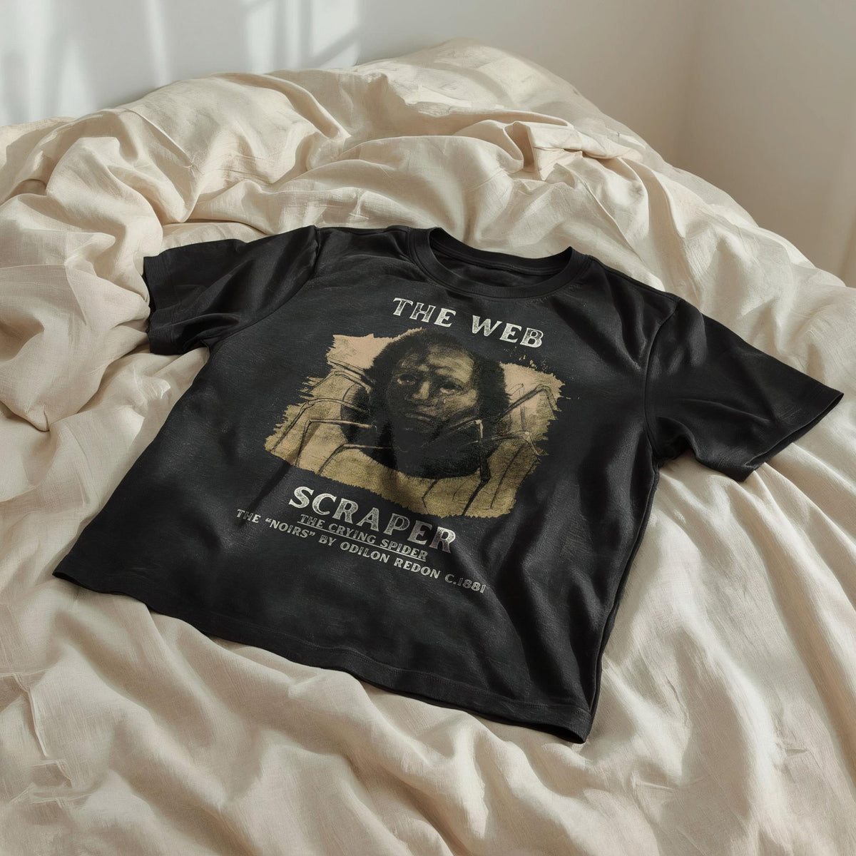 Black t-shirt with &amp;quot;The Web Scraper The Crying Spider&amp;quot; text and artwork.