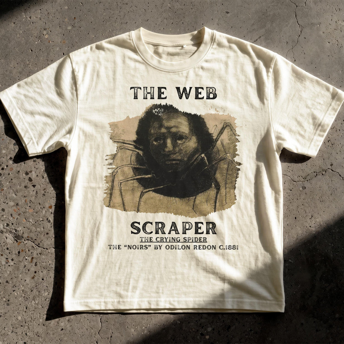 Cream t-shirt with &amp;quot;The Web Scraper&amp;quot; and spider art, by Odilon Redon.