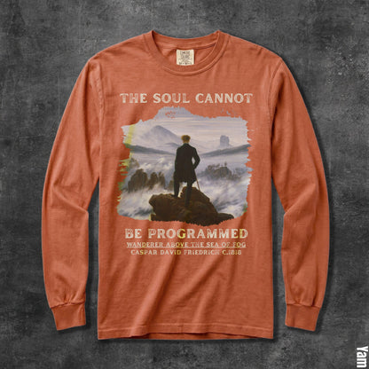 Orange long sleeve t-shirt with &amp;quot;The Soul Cannot Be Programmed&amp;quot; and painting.