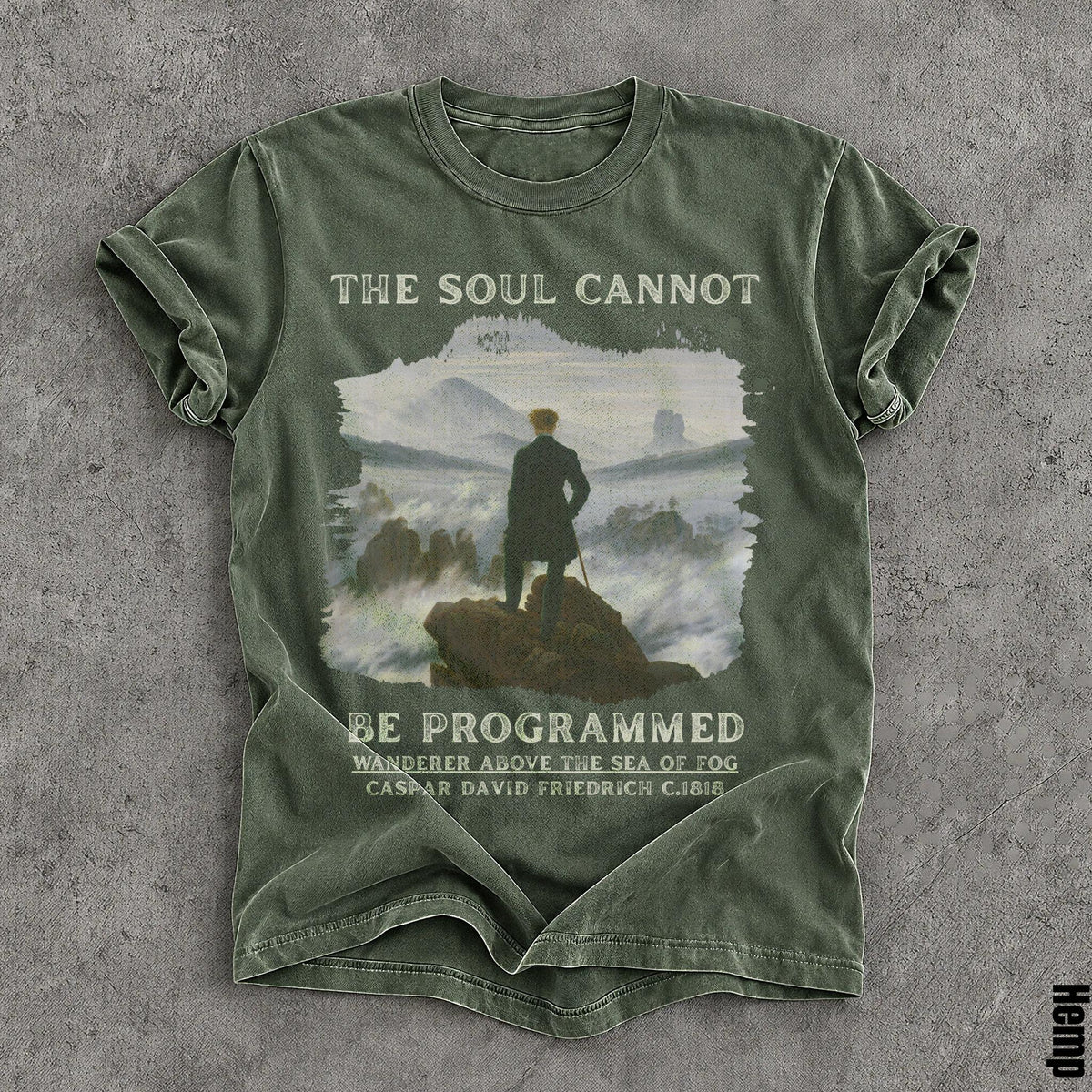 Green t-shirt with &amp;quot;The Soul Cannot Be Programmed&amp;quot; and artwork.