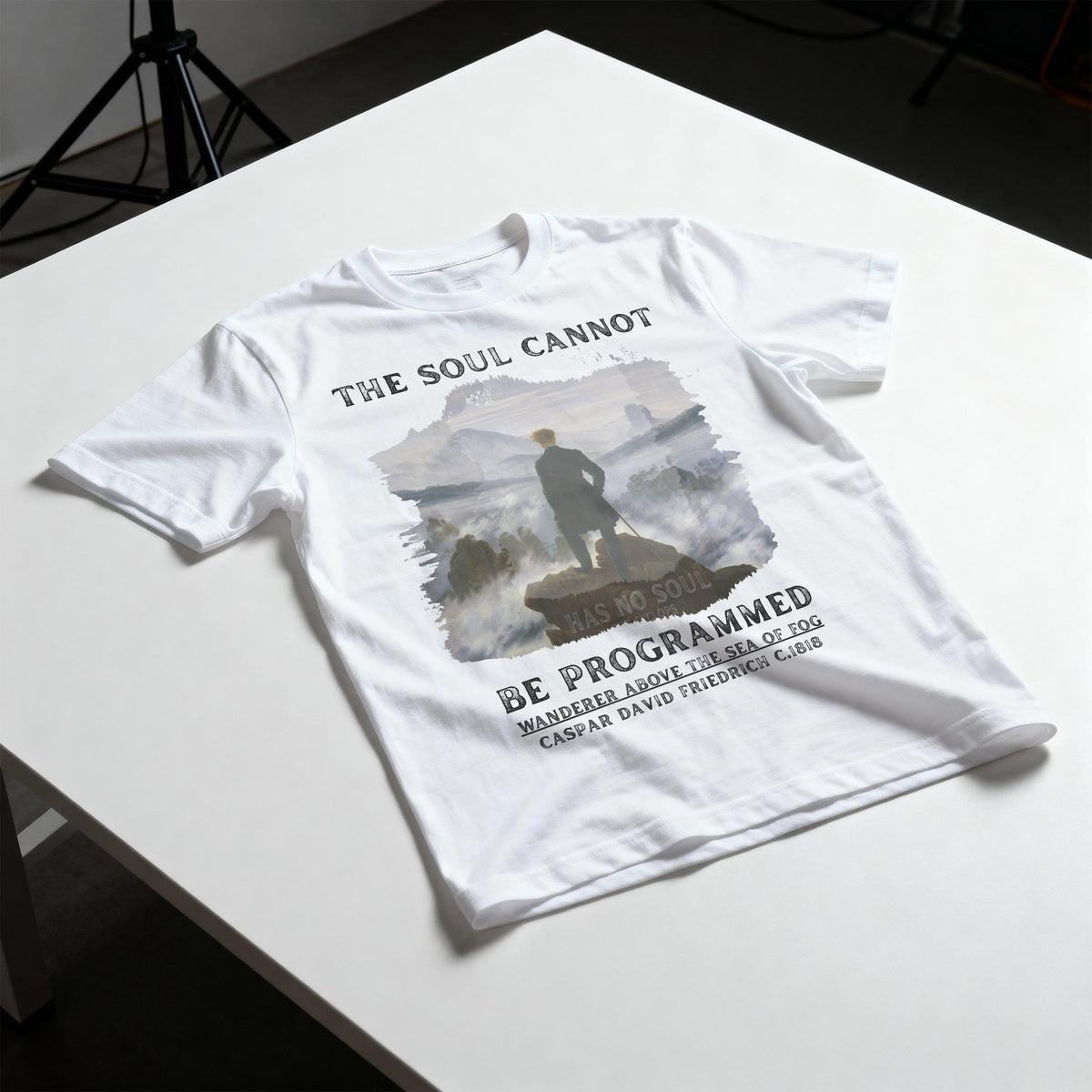 White t-shirt with &amp;quot;The Soul Cannot Be Programmed&amp;quot; and artwork by Caspar David Friedrich.