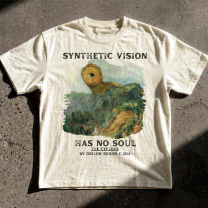 Cream t-shirt with &amp;quot;Synthetic Vision Has No Soul The Cyclops&amp;quot; text and painting.