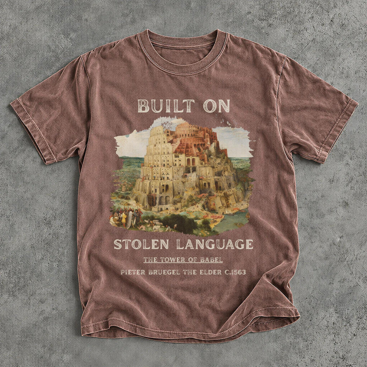 T-shirt with &amp;quot;BUILT ON STOLEN LANGUAGE&amp;quot; and Tower of Babel painting.