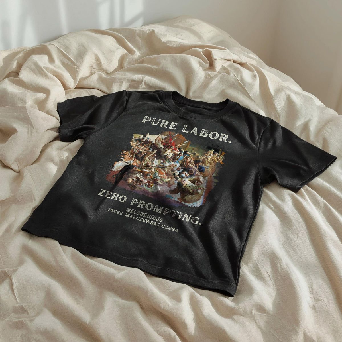 Black t-shirt with &amp;quot;PURE LABOR. ZERO PROMPTING.&amp;quot; and painting of figures.