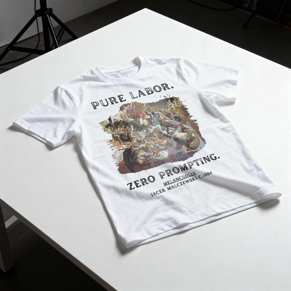 White t-shirt with &amp;quot;PURE LABOR.&amp;quot; and &amp;quot;ZERO PROMPTING.&amp;quot; text and artwork.