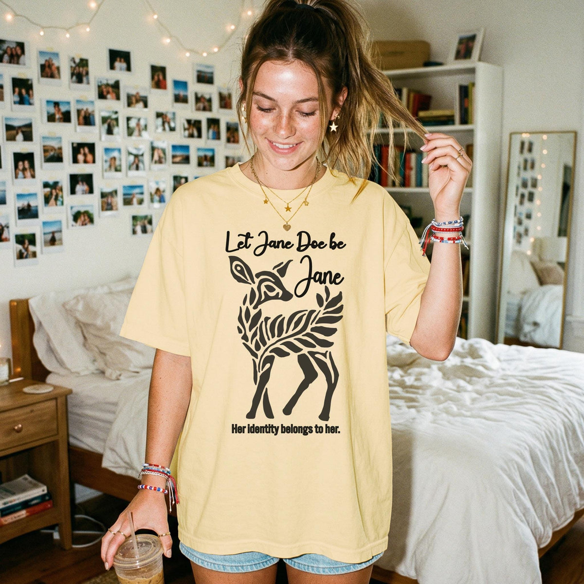 Yellow t-shirt with deer graphic and text &amp;quot;Let Jane Doe be Jane. Her identity belongs to her.&amp;quot;
