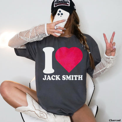 Charcoal grey t-shirt with &amp;quot;I ❤️ JACK SMITH&amp;quot; graphic, worn by a seated person.