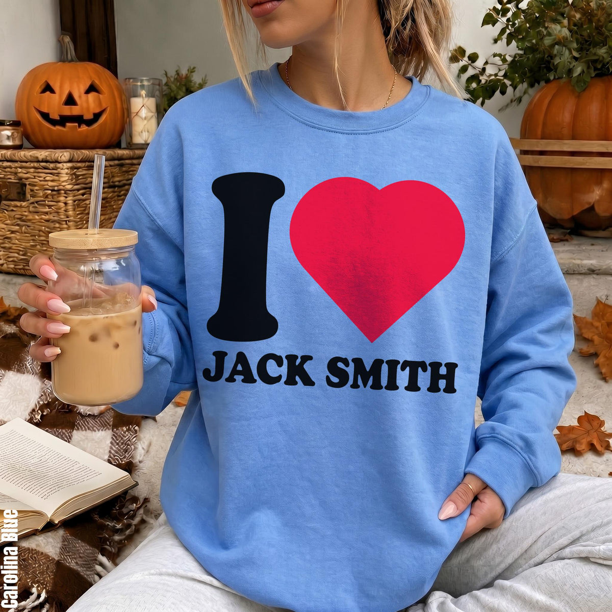 Blue sweatshirt with &amp;quot;I heart JACK SMITH&amp;quot; graphic and text &amp;quot;Carolina Blue&amp;quot;.