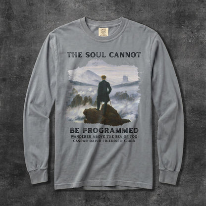Grey long-sleeve t-shirt with &amp;quot;The Soul Cannot Be Programmed&amp;quot; and artwork.