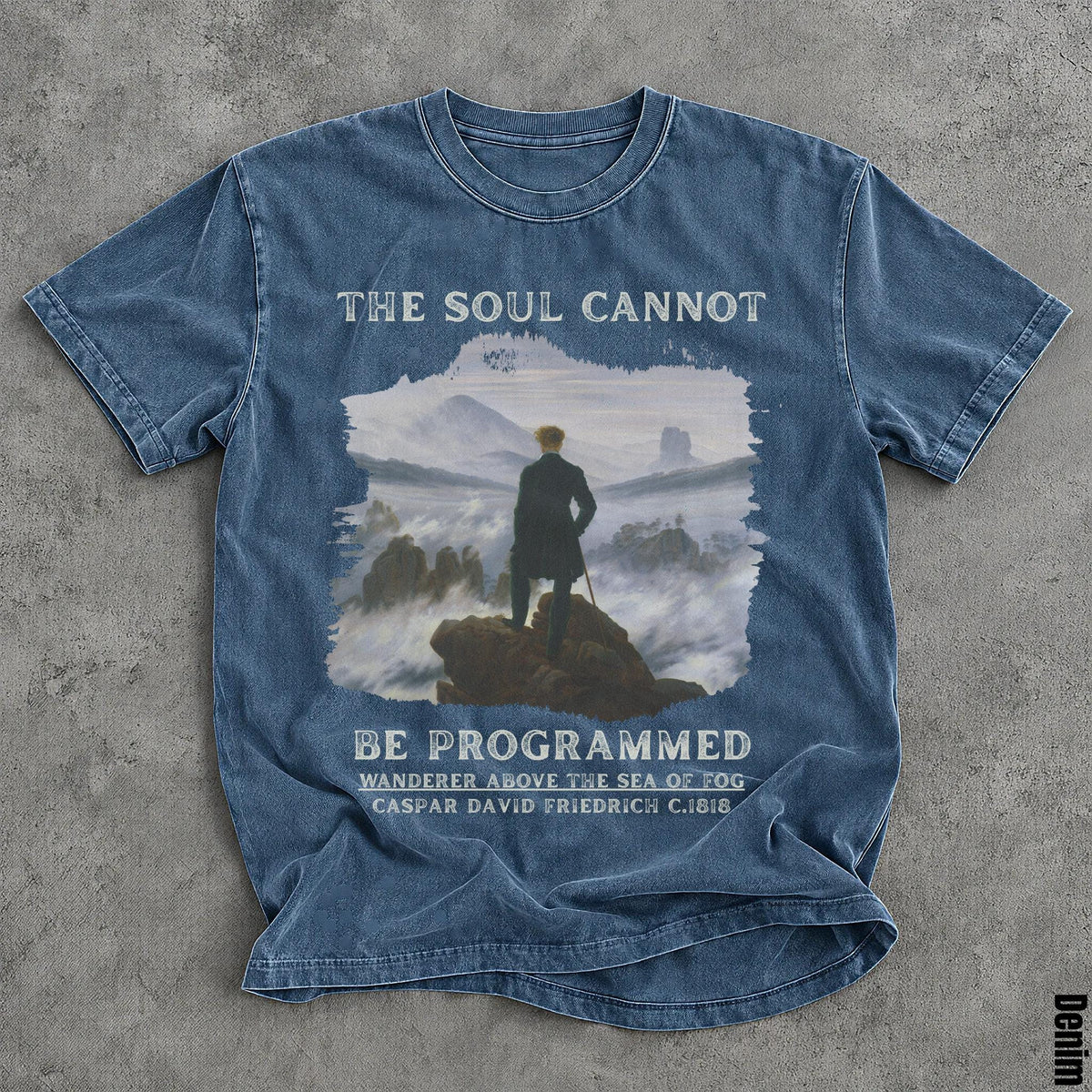 Blue t-shirt with &amp;quot;THE SOUL CANNOT BE PROGRAMMED&amp;quot; and painting.