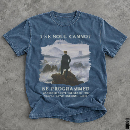 Blue t-shirt with &amp;quot;THE SOUL CANNOT BE PROGRAMMED&amp;quot; and painting.
