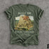 Green t-shirt with "BUILT ON STOLEN LANGUAGE" and Tower of Babel artwork.
