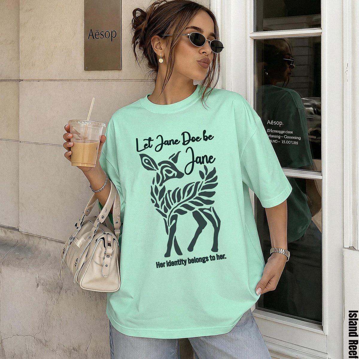 Mint green t-shirt with &amp;quot;Let Jane Doe be Jane. Her identity belongs to her.&amp;quot; graphic.