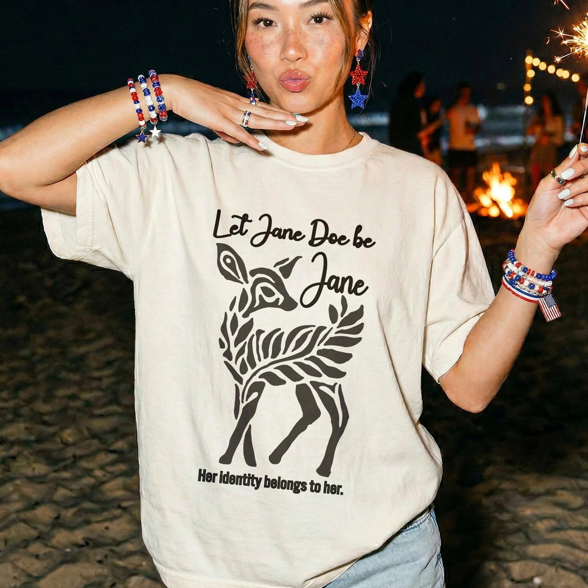 Cream t-shirt with deer graphic and text &amp;quot;Let Jane Doe be Jane. Her identity belongs to her.&amp;quot;
