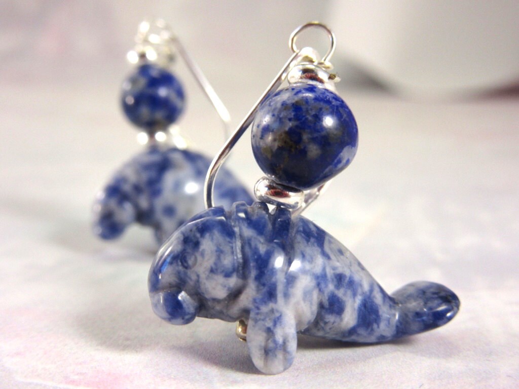 Manatee Earrings - Blue sodalite Earlobe Earrings showcasing a beautiful carved stone design, perfect for beach lovers and animal enthusiasts.