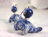 Manatee Earrings - Blue sodalite Earlobe Earrings showcasing a beautiful carved stone design, perfect for beach lovers and animal enthusiasts.