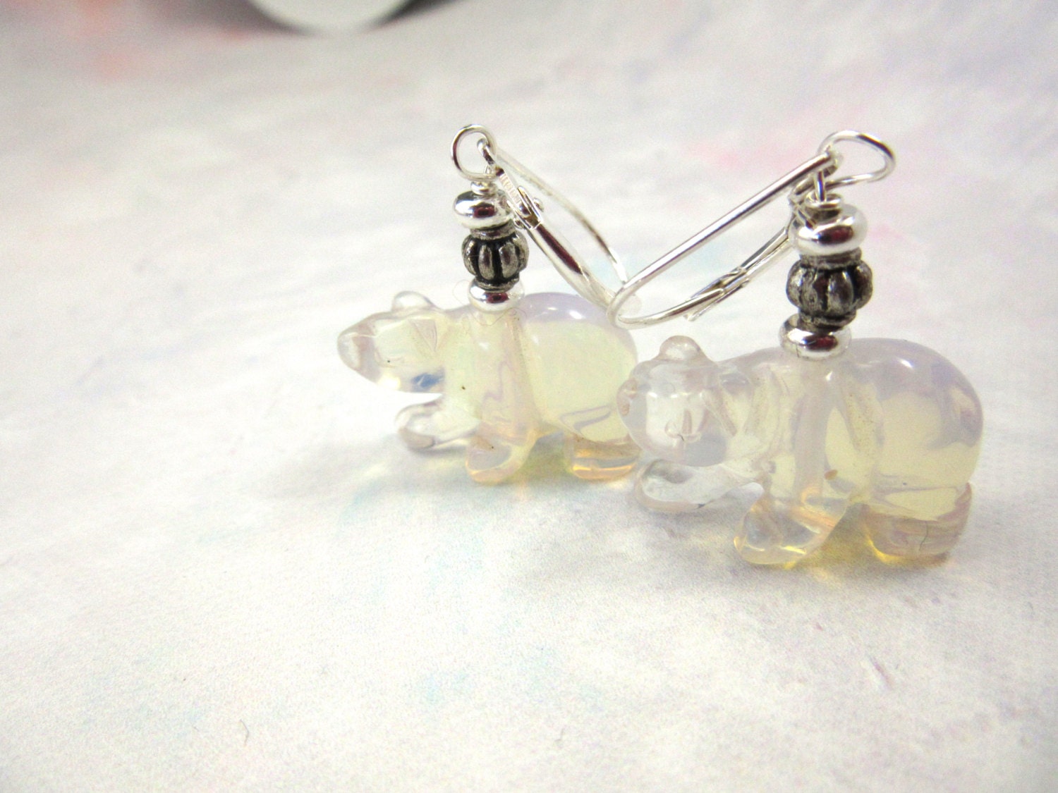 Close-up of White Bear Earrings showcasing the intricate craftsmanship, ideal gift for animal enthusiasts, made from transparent stone.