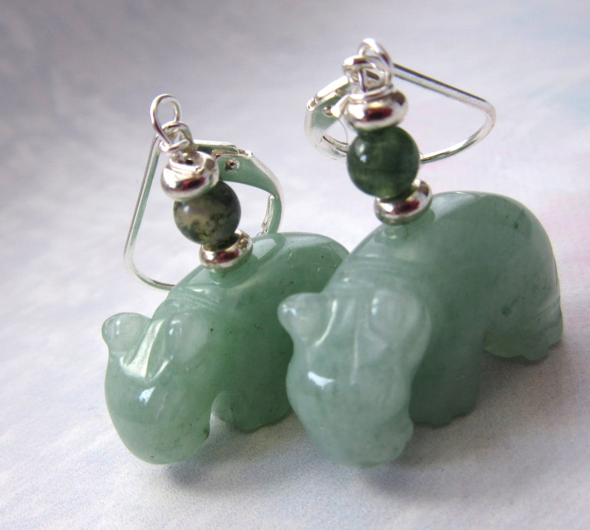 Hippopotamus jewelry featuring green aventurine carved stone hippo earrings, ideal for animal lovers.