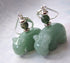 Hippopotamus jewelry featuring green aventurine carved stone hippo earrings, ideal for animal lovers.