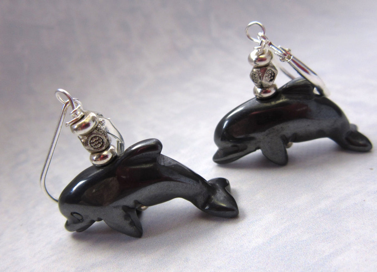 Dolphin Earrings Carved Black Hematite - Glossy detailed image of dolphin earrings, ideal gift for animal trainers and zoologists.