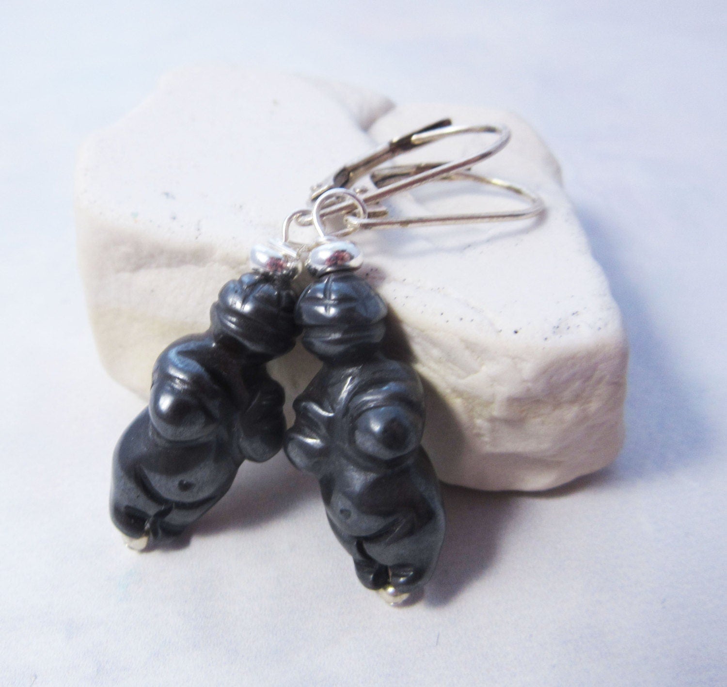 Goddess earrings featuring the Venus of Willendorf, handcrafted carved stone jewelry symbolizing power and femininity, perfect as a zen gift for her.