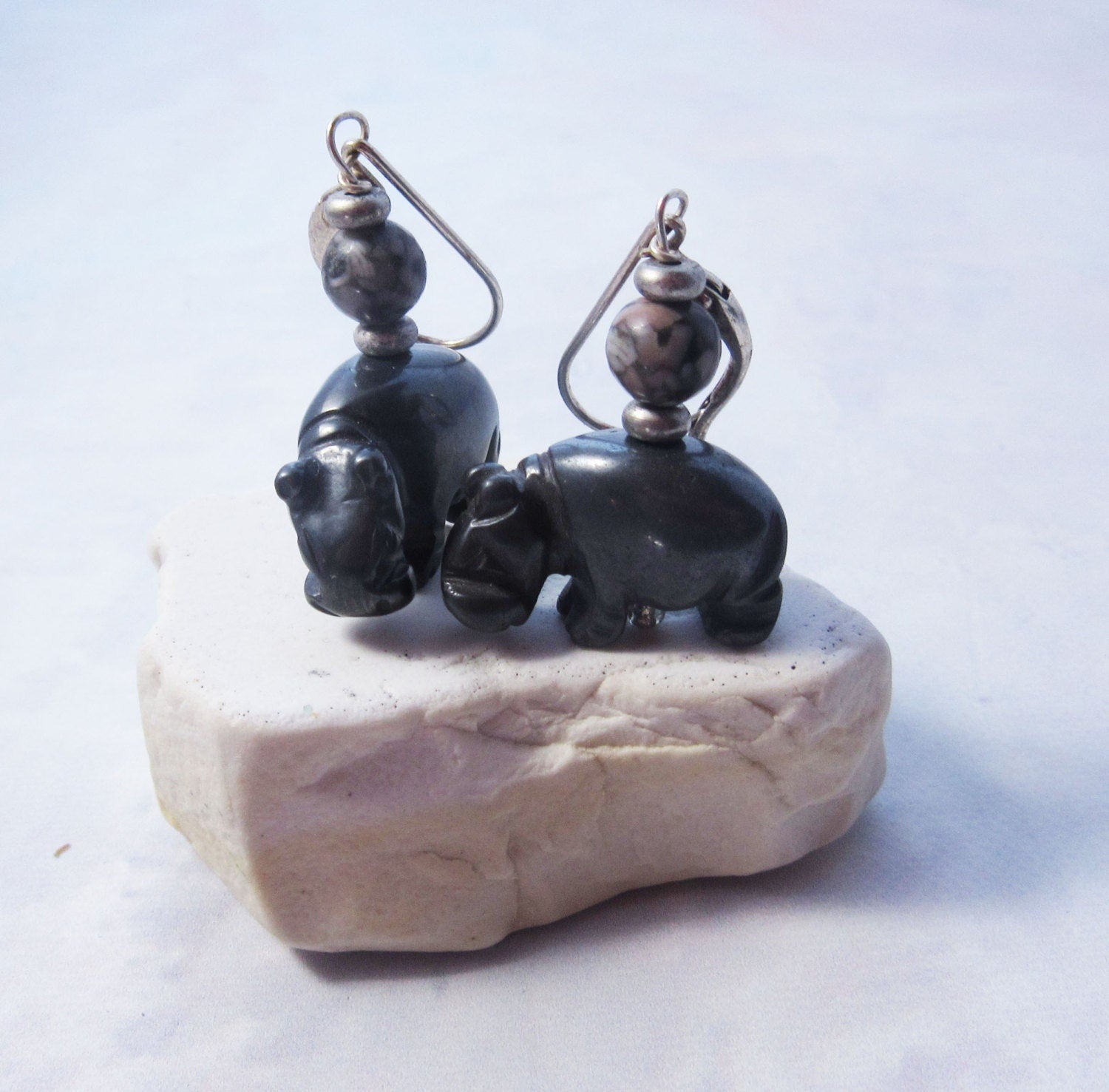 Hippo earrings with a playful design, made of carved hematite, perfect for any occasion.