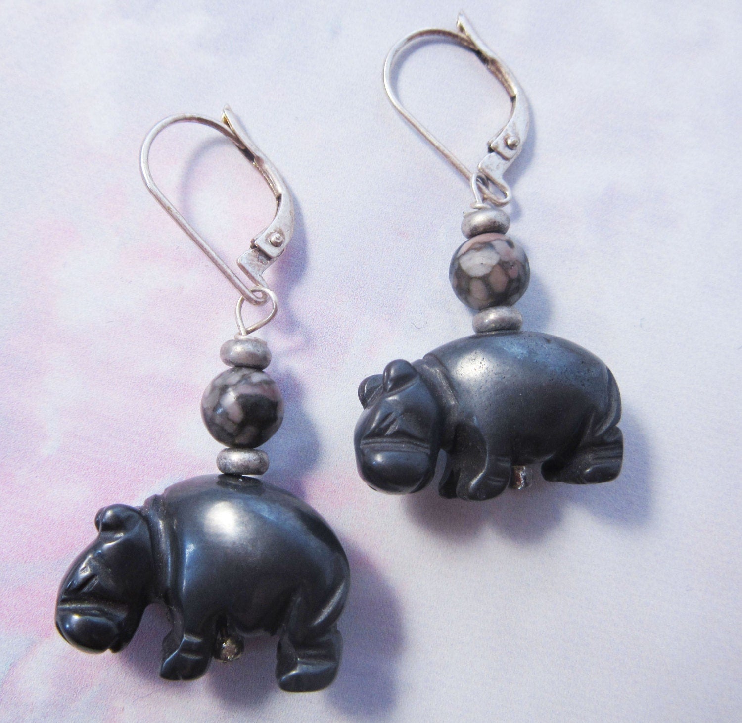 Stylish hippo earrings made from stone, highlighting charming hippopotamus designs for animal lovers.