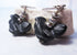 Hand-Carved Stone Black Hen Earrings showcasing a unique design for farm aesthetic jewelry lovers.